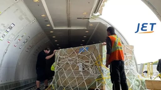 Jet worldwide air cargo interior being loaded