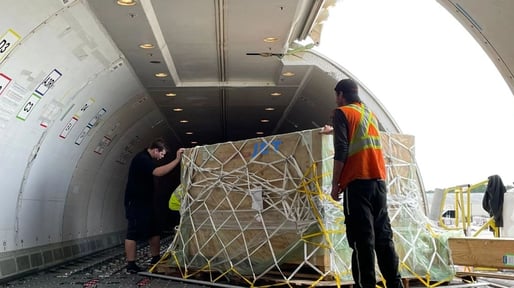 Jet worldwide air cargo interior being loaded