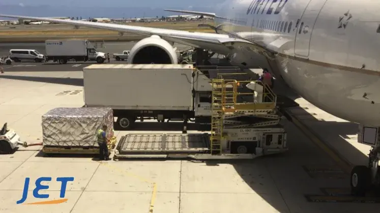 air freight being loaded on plane