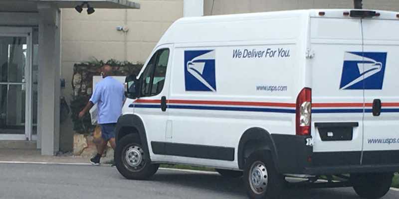 USPS van outside residential building